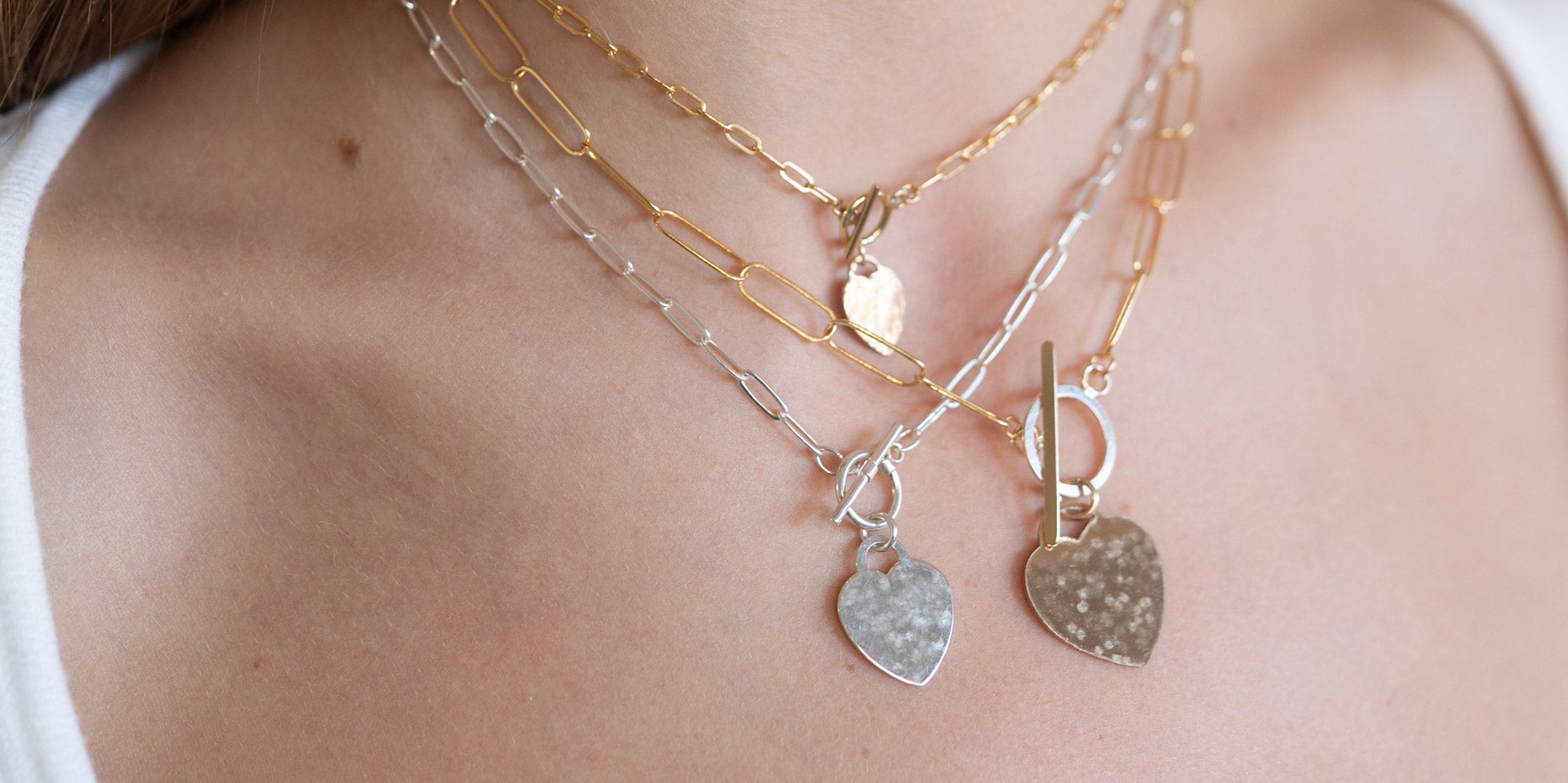 Mother’s Day jewelry gifts including 14k gold filled birthstone necklaces, heart charms, and custom bracelets from Jewel Ya