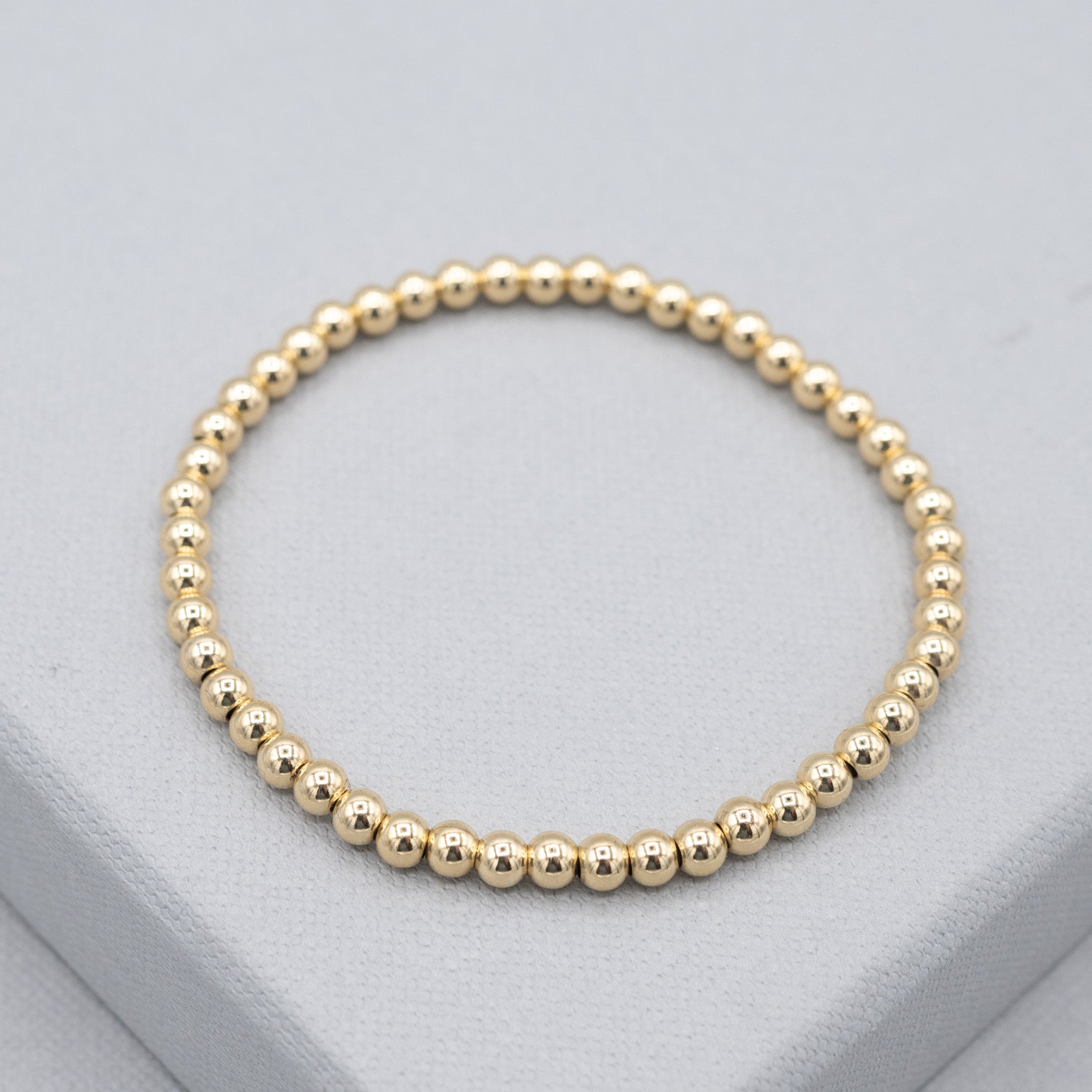 4mm 14kt Gold Filled Bead Bracelet with Small Round Sapphire